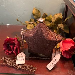 Cross body purse NWT. Star shape. Bronze glitter.